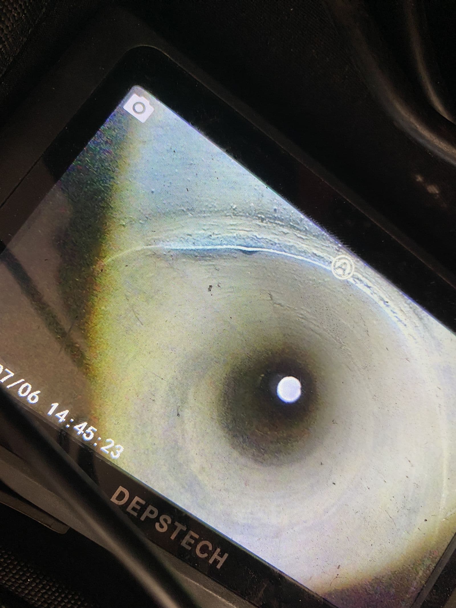 Camera-scope inspection footage of a clean flue interior